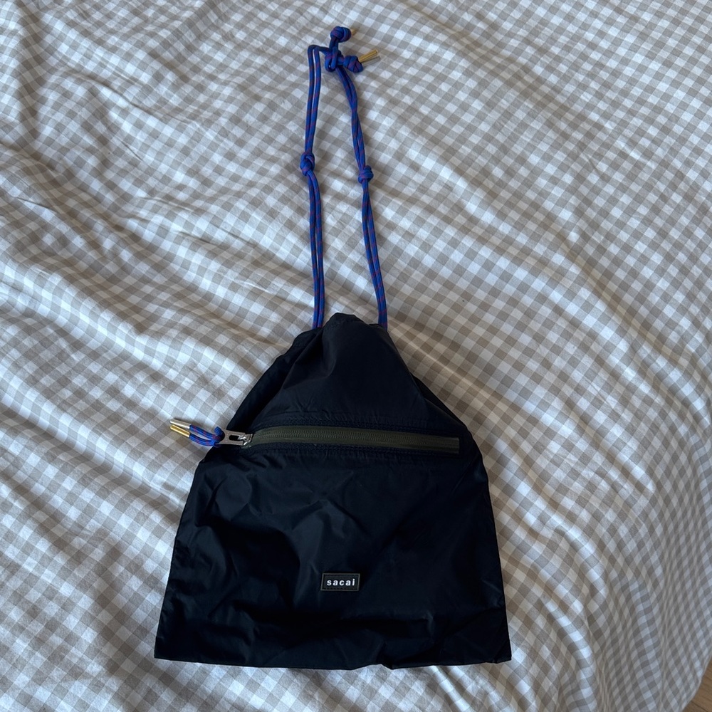 Sacai Black Drawstring Backpack with Blue Cord